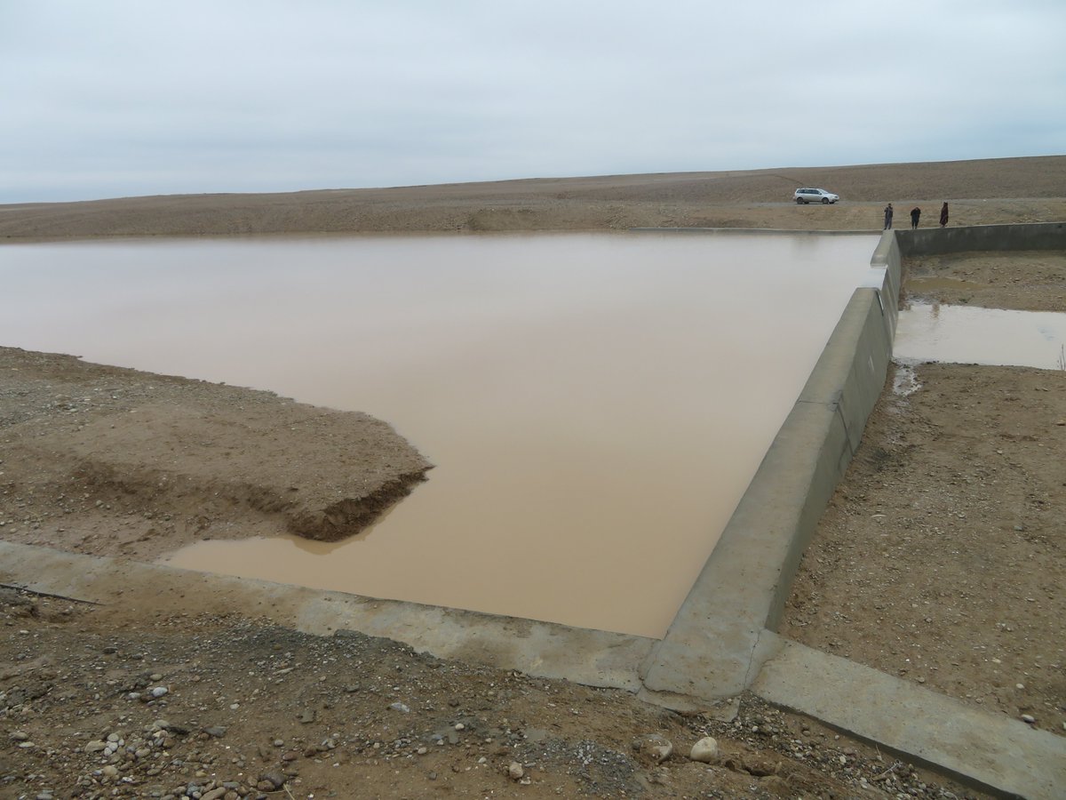 UNODC_COAFG's tweet photo. Rainwater harvesting structures constructed by @dacaar under the UNODC #AD programme in the drought affected Helmand. 

The stored rainwater enhances #alternativelivelihoods through benefitting livestock owners &amp; farmers, recharging under groundwater and preventing flash floods. https://t.co/3sSZ29RxYs