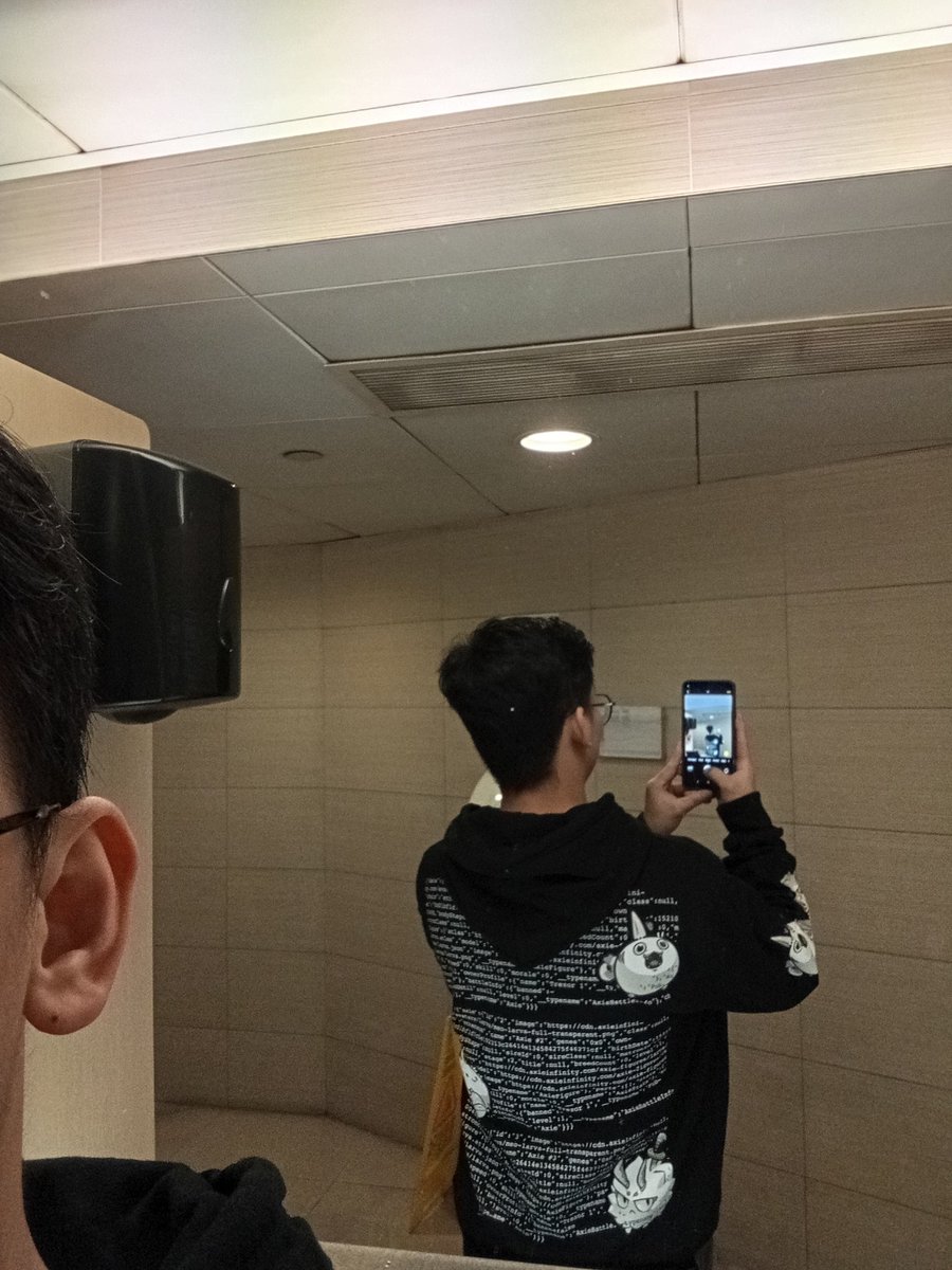 theofficialKMB's tweet photo. Walking around the streets of Macau wearing my #AxieMerch hoodie.

Waiting for someone to shout "Hello manager!" 😂😂😂
#AxieInfinity
#Ronin https://t.co/uvrEVxkOww