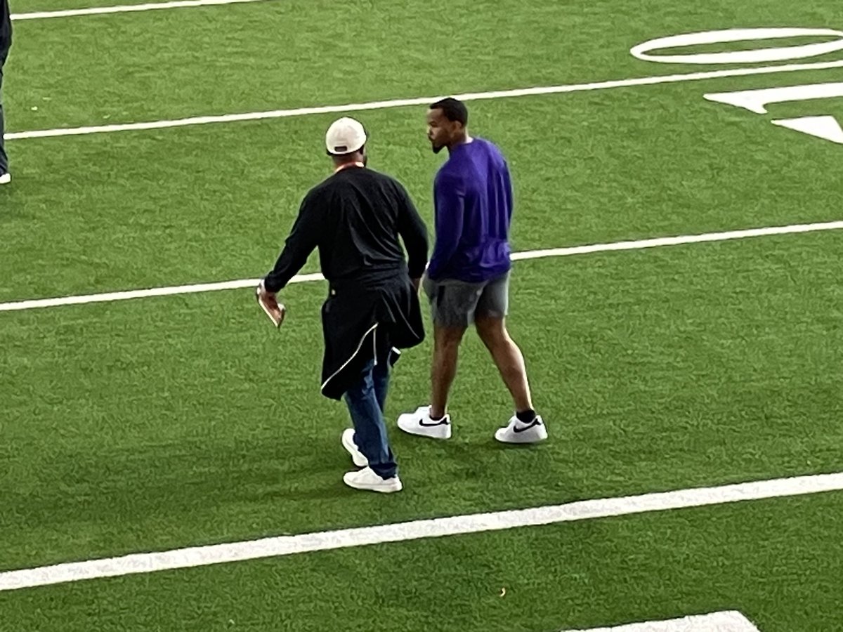 Mike Tomlin talking to Jeremiah Trotter Jr.