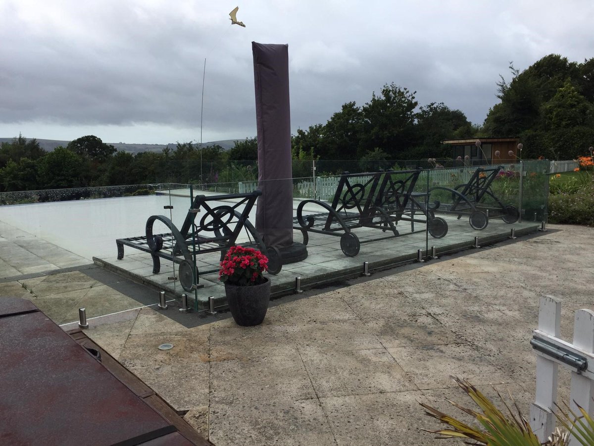 For this West Sussex home, another our of beautiful, bespoke glass balustrades proved the perfect fit for our customer.

Fitted on Stainless steel, swimming pool grade spigots, our toughened glass balustrade created a safety barrier around the pool.

#glassbalustrade #pandpglass
