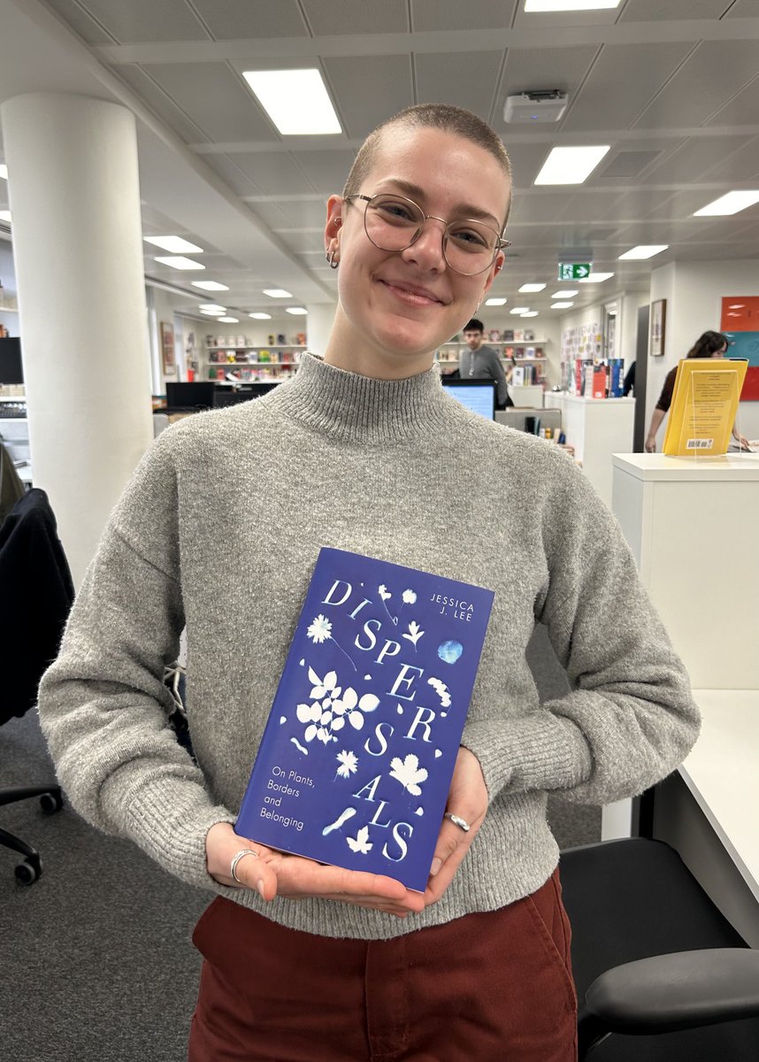 Designer and cyanotype maker ⁦@jstillustrates⁩ with the first finished copy of ⁦DISPERSALS by ⁦@jessicajlee⁩ —