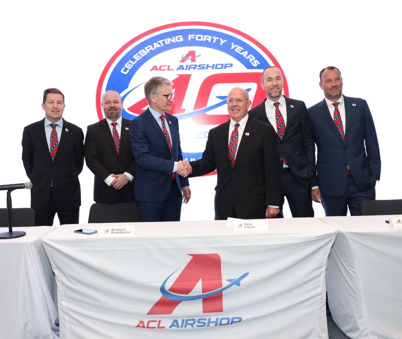ACL AIRSHOP: Press Conference in Hong Kong at IATA's World Cargo Symposium. Ceremonial handshake photo between CEO, Bernhard Kindelbacher and Steve Townes, Vice Chairman and previous CEO for past 9 years. #ACLairshop #AirCargo #IATA #HongKong #HighPerformanceCulture