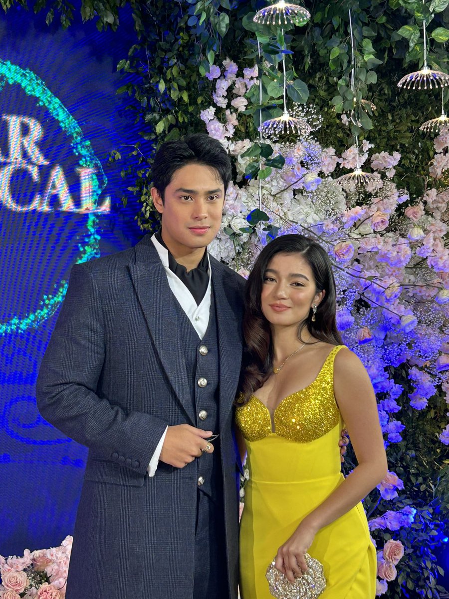 LOOKING GOOD IS SUCH A DONBELLE THING ✨ LOOK: Donny Pangilinan and Belle Mariano channel “Beauty and the Beast” in their elegant prom outfits at the #StarMagicalProm2024. Pangilinan is handsome in his blue suit while Mariano is beautiful in her yellow gown. | @HMallorcaINQ
