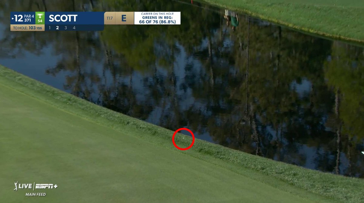 Sean_Zak's tweet image. Adam Scott sends a low, hooking wedge screaming over the green on 12.

Grabbed by thin strip of rough that now lines the hazard. Absolutely should be a 5 at best! Pitched to 20 inches and made the comfiest 4.