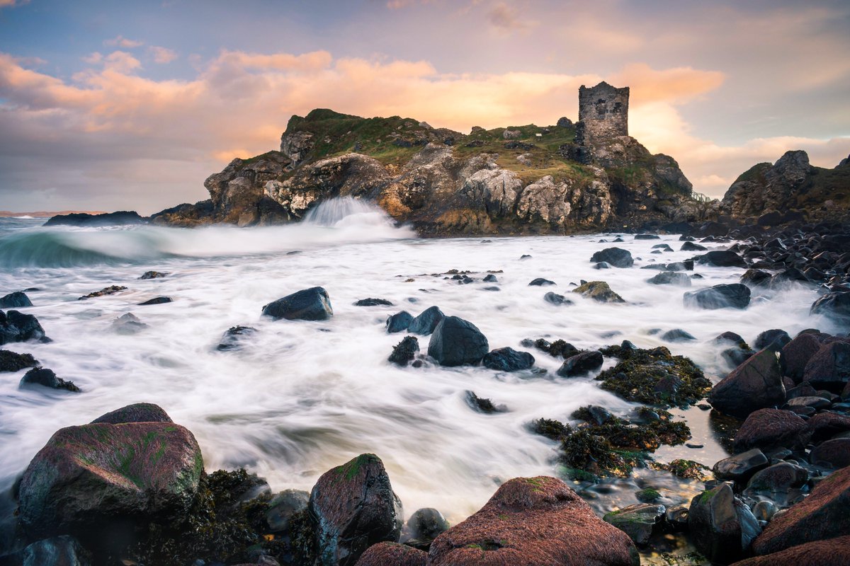 Rough seas below Kinbane Castle, located in County Antrim, Northern Ireland, on a headland between Ballycastle and Ballintoy. The name comes from the Irish for 'white head', referring to the limestone of the promontory it was built on. Wikipedia and me. NMP.