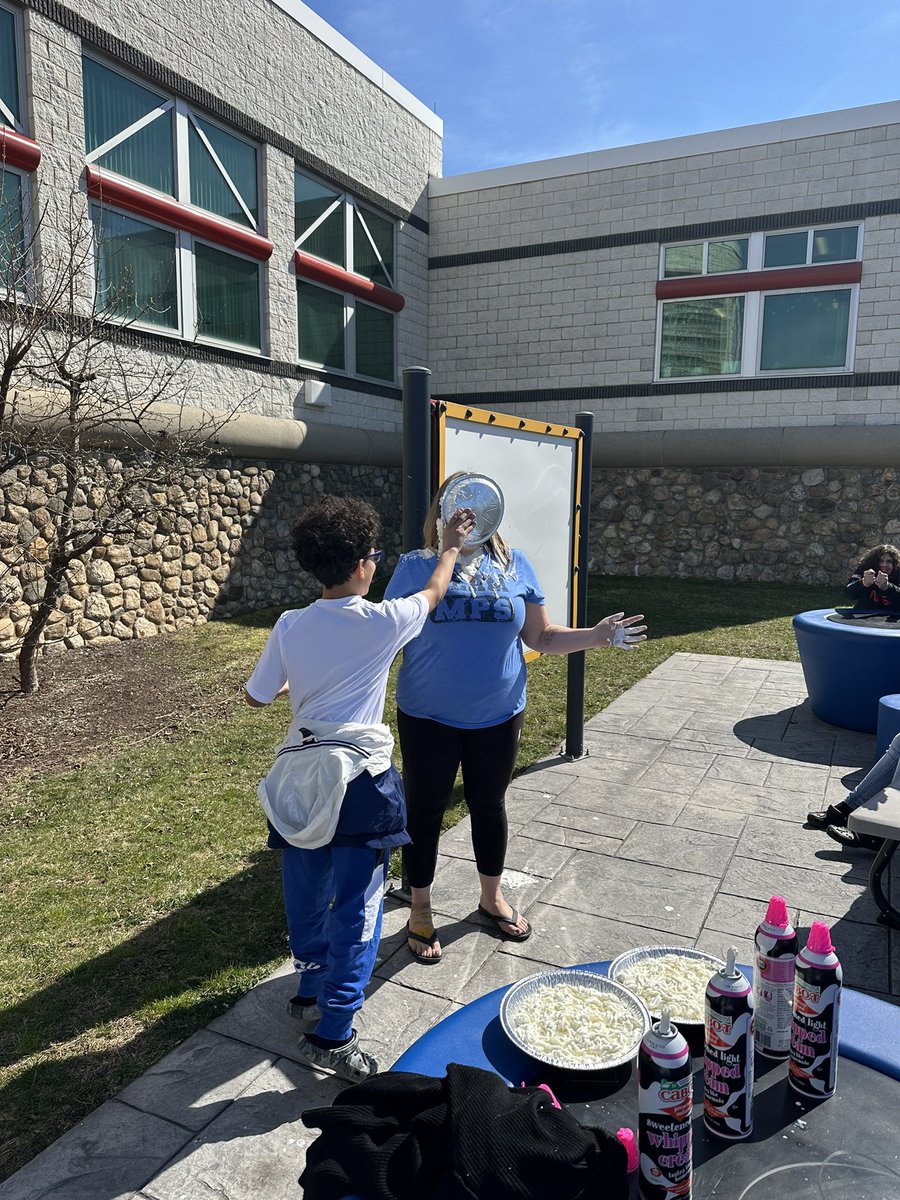 MsGaffey13's tweet photo. Pi Day down in Team Optimize! Ms. Pergolotti braved the whipped cream pies from our 4 winners who memorized the most digits from their class! @EMSKowalchukAP @lyons_barton #teamoptimize https://t.co/lTTYEX3b0c