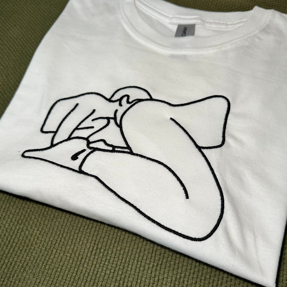 tehe 🫢

I may have put that silly embroidery on a t-shirt! 

Only available in white, sizes S-XXL (I can do larger if needed)

Grab yours at the link below!! 

shorturl.at/lLZ27