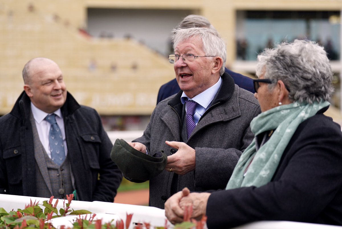 Sir Alex Ferguson, owner of Monmiral, celebrates winning the Pertemps Network Final, which was ridden to victory by Harry Cobden on day three of the 2024 Cheltenham Festival at Cheltenham Racecourse