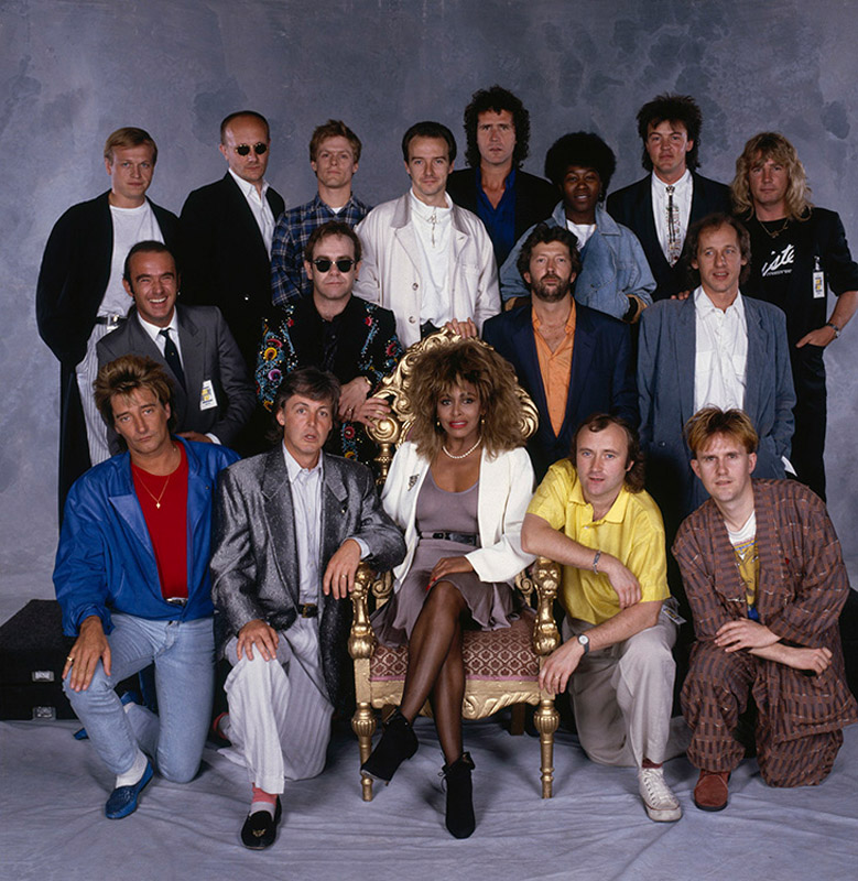 Phil pictured amongst music royalty in this promo shot for The Princes Trust 10th Anniversary record. Can you name all the artists in this photo? #tbt