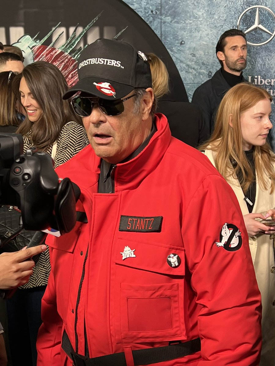 ErikDavis's tweet image. At the premiere of #Ghostbusters in NYC and I love how everyone is in a suit and tie on the red carpet, and then you got Dan Aykroyd just going head-to-toe full Ghostbusters.