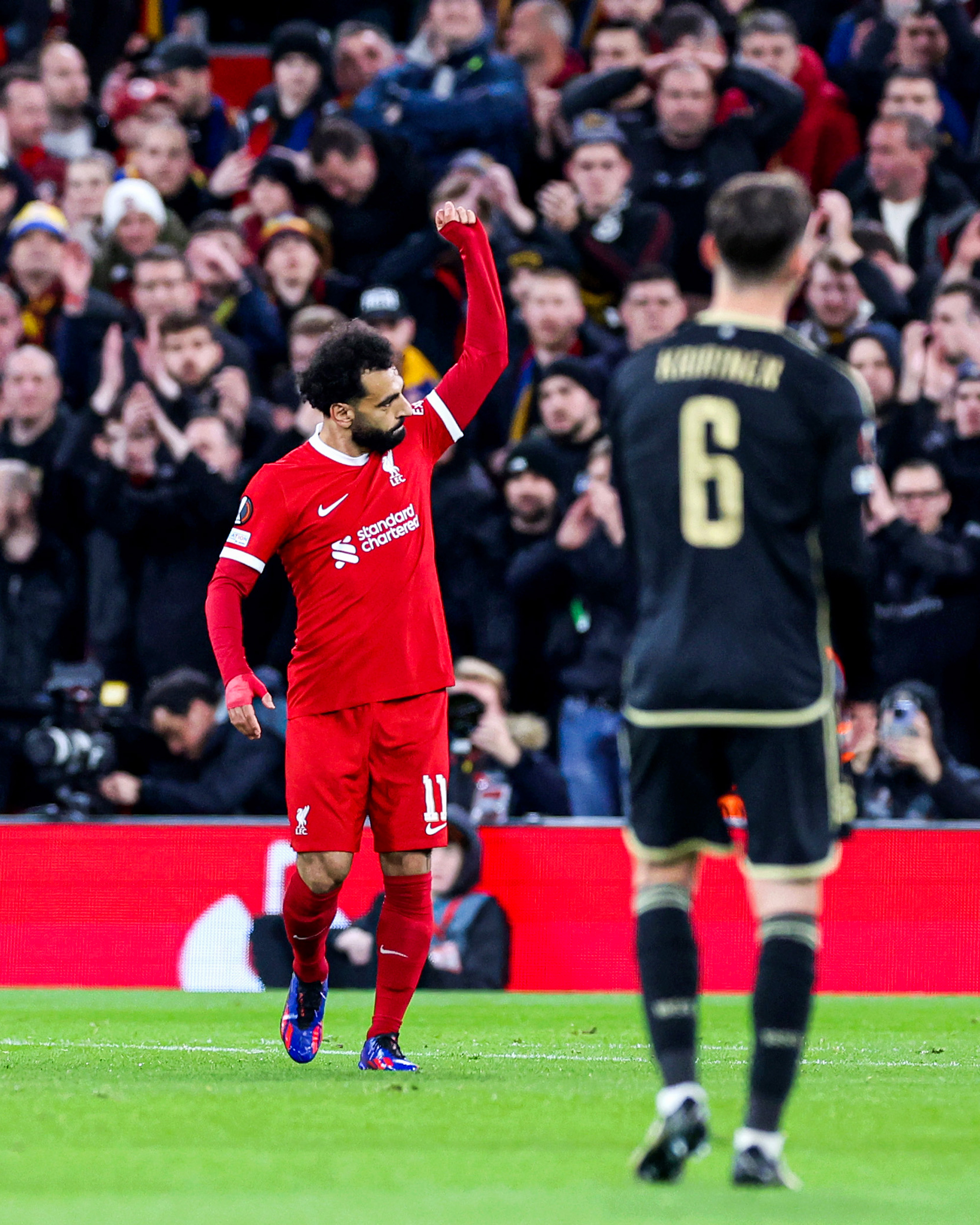 Mo Salah celebrates after scoring his 20th goal of the season in Liverpool's fixture against Sparta Prague.
