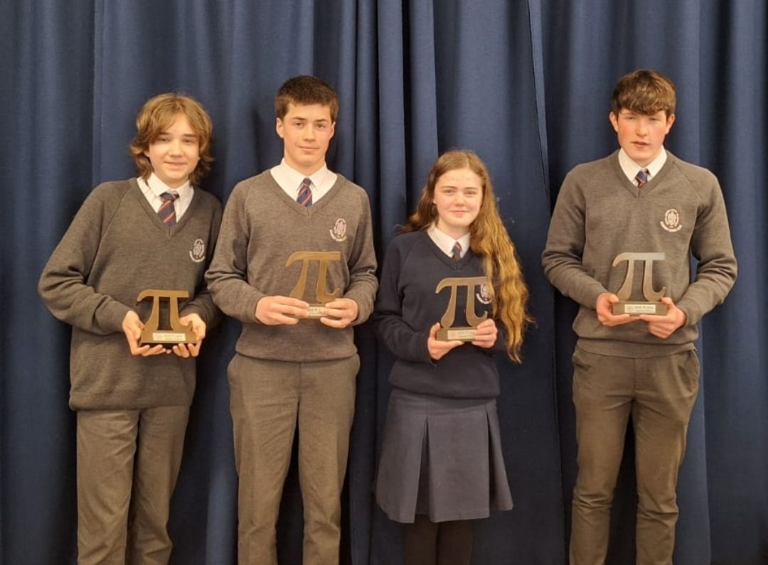 CONGRATULATIONS JUNIOR MATHS TEAM! Our Junior Maths team competed at the IMTA 'Pi quiz' schools competition today and came away with 1st place. They will now compete in the National competition in Maynooth Well done Adam Foley, Róisín Spratt, Makary Wahro and Oisín Choo.