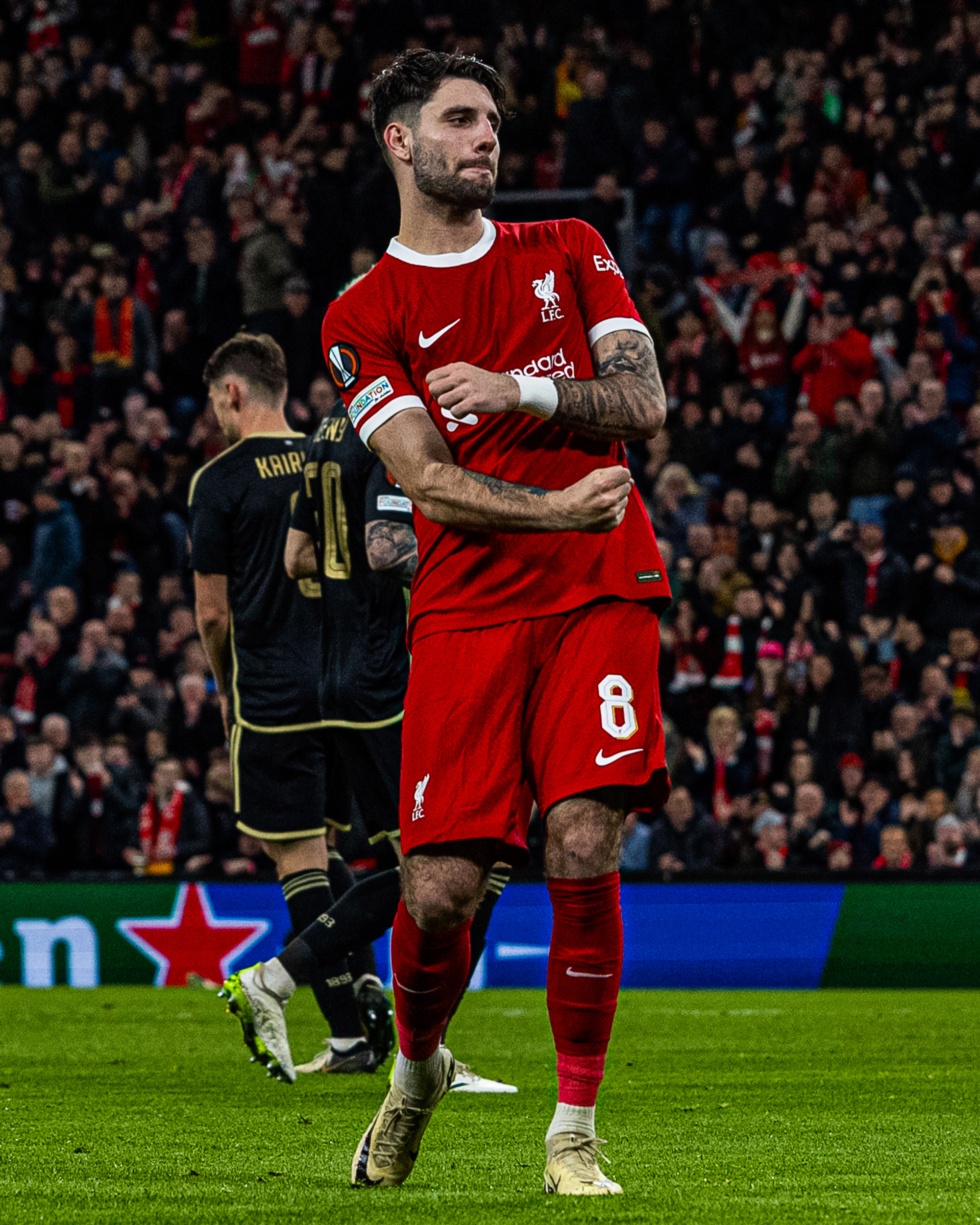 Photography of Dominik Szoboszlai celebrating after scoring during Liverpool v Sparta Prague.