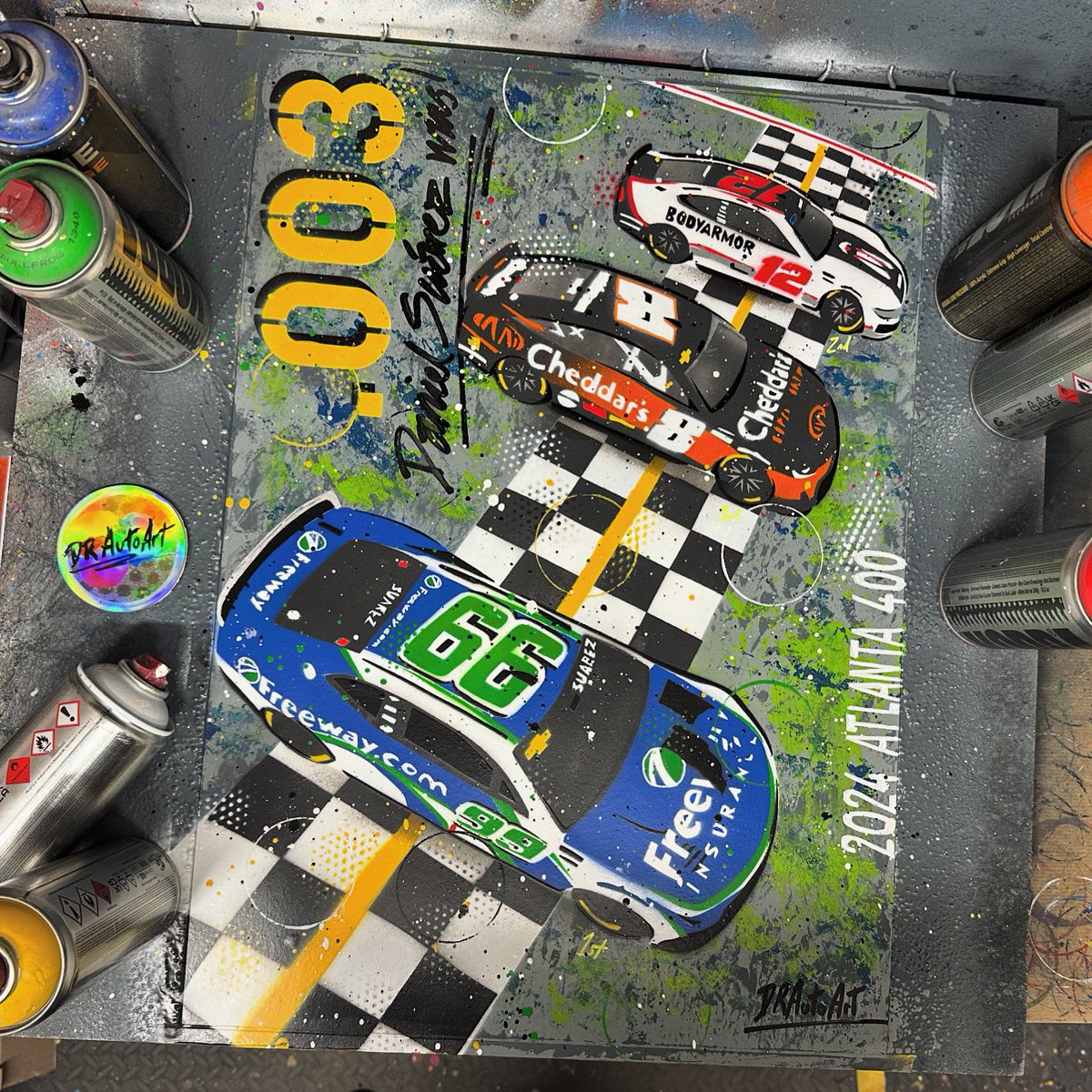 DRAutoart's tweet photo. This is what 0.003 seconds looks like in graffiti art! NASCAR Atlanta400 photo finish painting finished today. It’s in my shop now 🙌🏻 #drautoart
https://t.co/3b8HFauvr6
#danielsuarez #danielsuárez #ds99 #99 #nascar #trackhouse #trackhouseracing #teamtrackhouse #atlanta400 https://t.co/SQB3gtiQiX