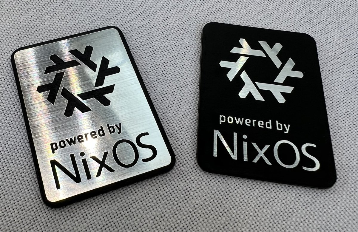 Are you at NixCon ❄️ NA? 🇺🇸 

Want one of these exclusive NixOS case badges? ✨

Come and find me in the common area outside room 106 🙂

There are currently only 75 of these in the world, and I don't have many left 📉 #nixcon #scale21x