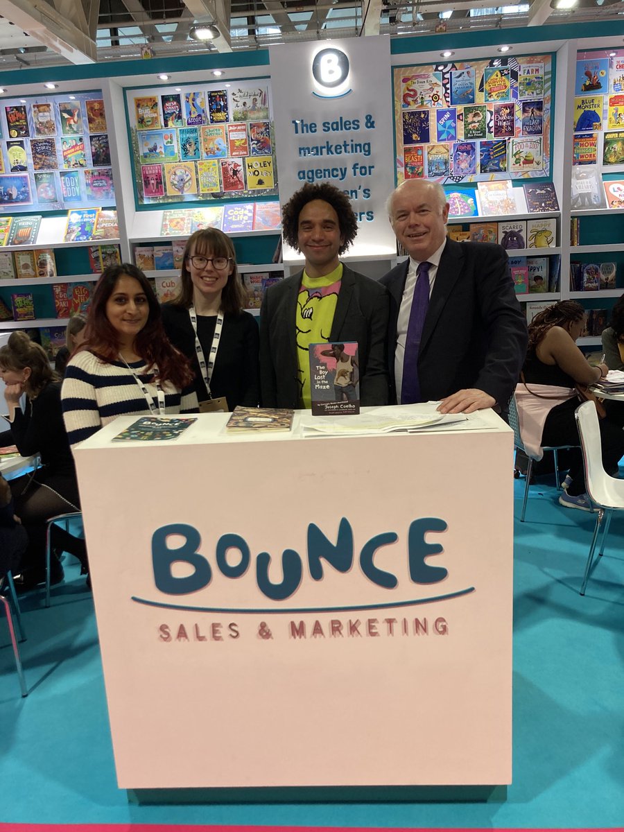 Dream team ⁦@bouncemarketing⁩ ⁦Robert Snuggs, Michaela 0’Callaghan and CJ Gajjar with ⁦@UKLaureate⁩ ⁦@JosephACoelho⁩ celebrating the shortlisting of #TheBoyLostInTheMaze for ⁦⁦⁦@CarnegieMedals⁩.  ⁦@LondonBookFair⁩. ⁦@bounce_wstones⁩