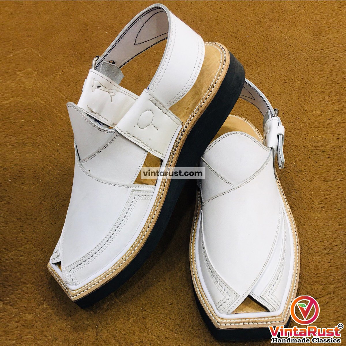 White Kaptaan Chappal! T

Shop Now:
buff.ly/3RBFJRe

#kaptaanchappal #peshawarchchappal #menschappals #whiteleather #handmade #culturalfashion #ethnicshoes #mensgifts #luxuryshoes #formalshoes #southasianshoes #menstyle #shopsmall #comfortablefootwear #everydaystyle