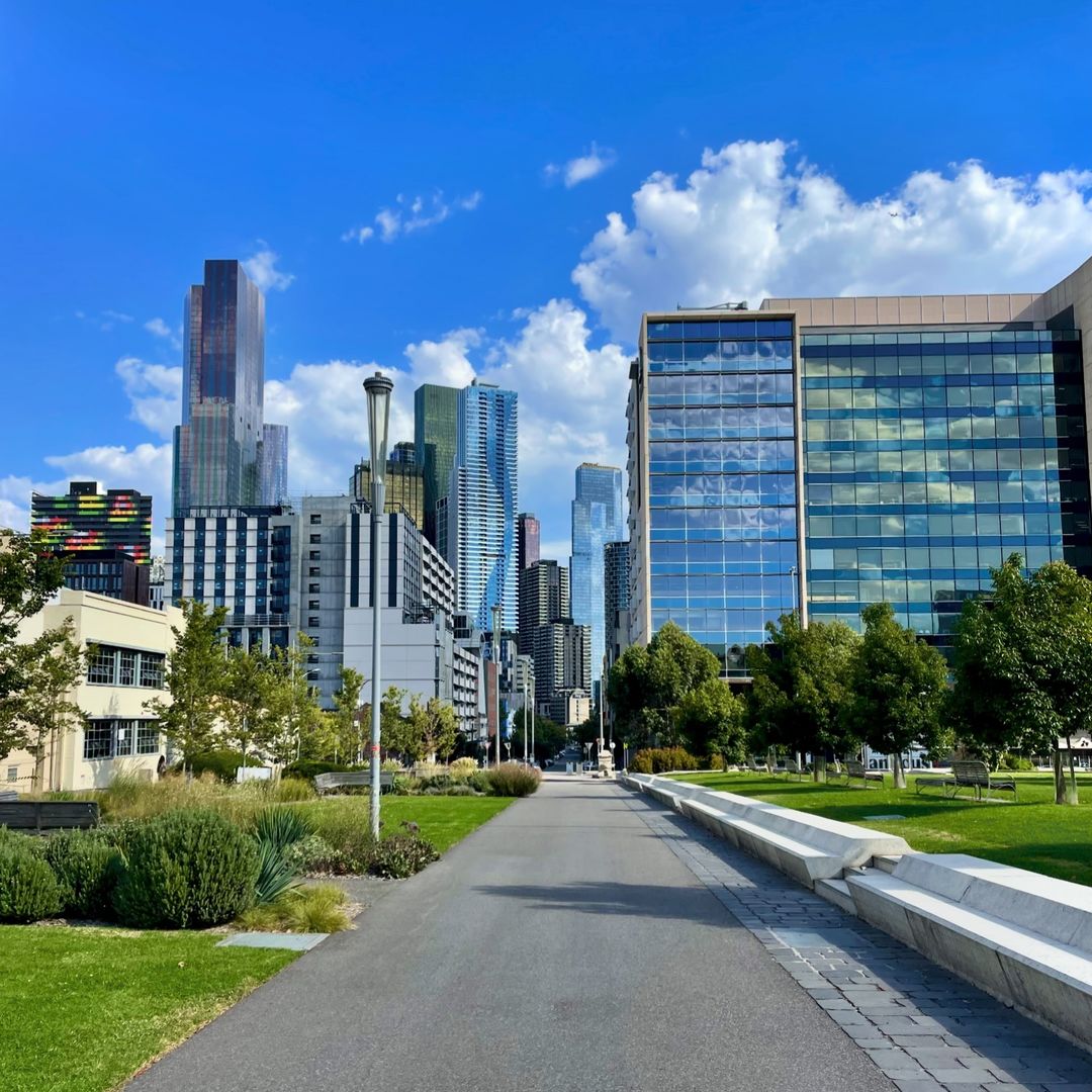 Repost: 📸 lucys365views frames the iconic Melbourne Law School against the vibrant backdrop of the Melbourne cityscape on a stunning summer's day ☀️🌇