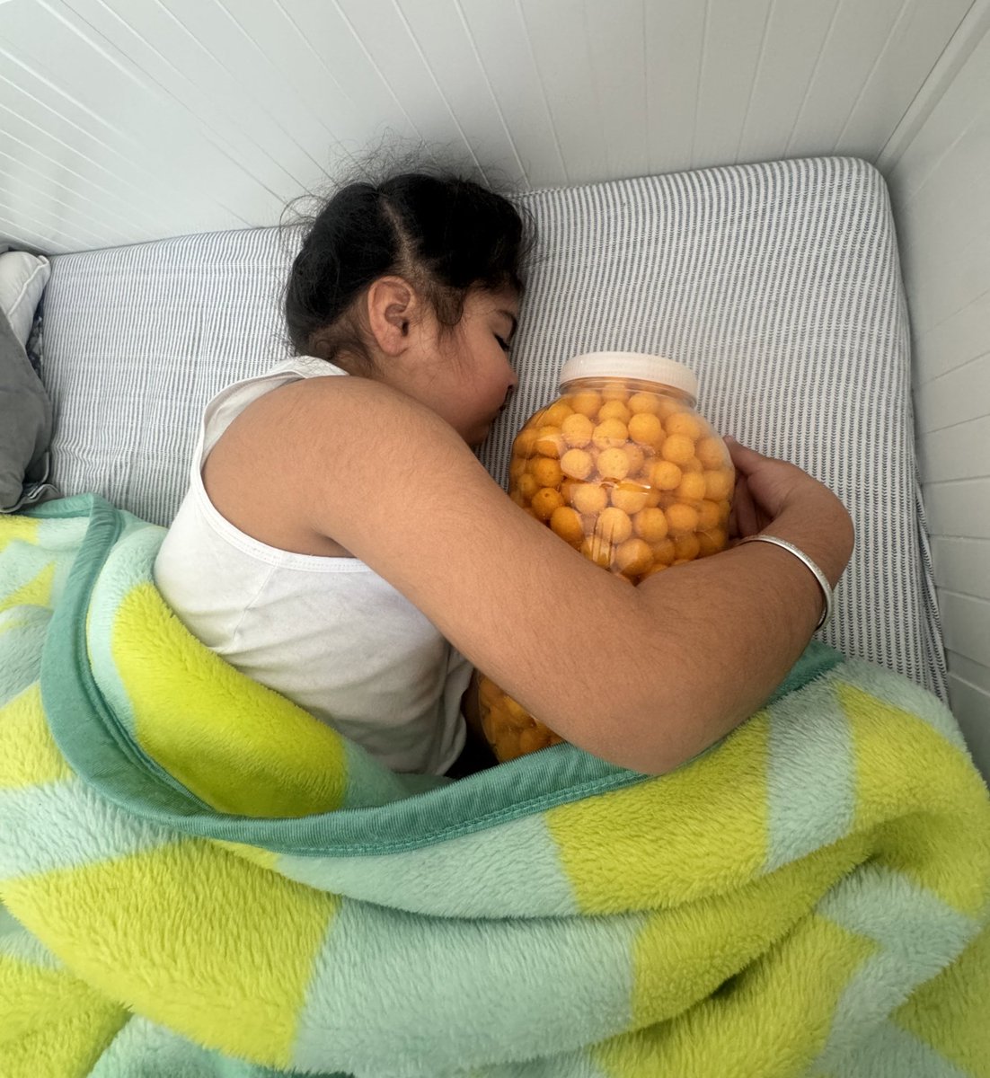 Caught in a cheesy love affair: My son and his beloved cheeseballs.