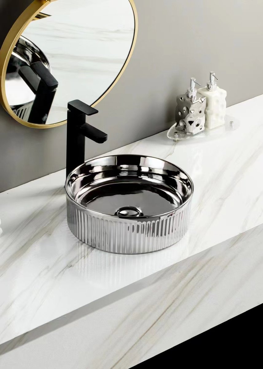New creative art basin, eletroplating shiny silver, decorates your bathroom to a higher level! #artbasin #newbathroomdesign #newdesin #newarrivals #bathroomsink #bathroomdesign #interiordesign #lavabo
