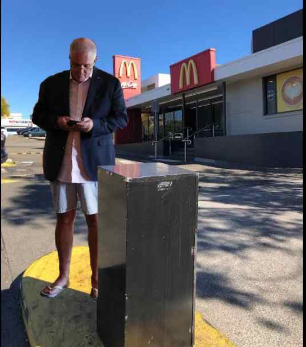 jjjove's tweet photo. Scott Morrison checking to see if he’s got the date right for his farewell dinner at Engadine Maccas as nobody’s there yet https://t.co/TpimJ58Xq2