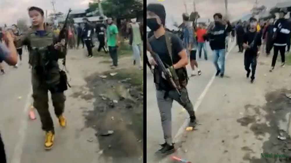 gisa_rose's tweet photo. Why are armed #Kuki_militants participating in a peace rally? Was there a #Quota_system for #Kuki_Zo to carry weapons during a peace solidarity rally? Could it be that my understanding of the concept of #Peace is flawed? Where is @NIA_India? Kindly investigate this issue as well. https://t.co/e5NXzMx49t