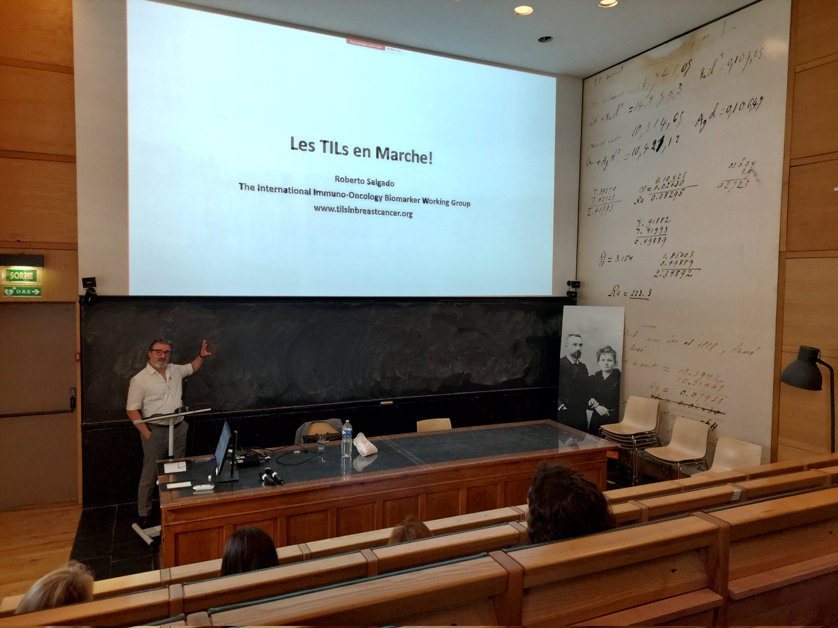 TILs and their implications for the management of early TNBC. The ever promising biomarker. Roberto Salgado in the Marie Curie amphitheatre (yes, that's her original table) @institut_curie