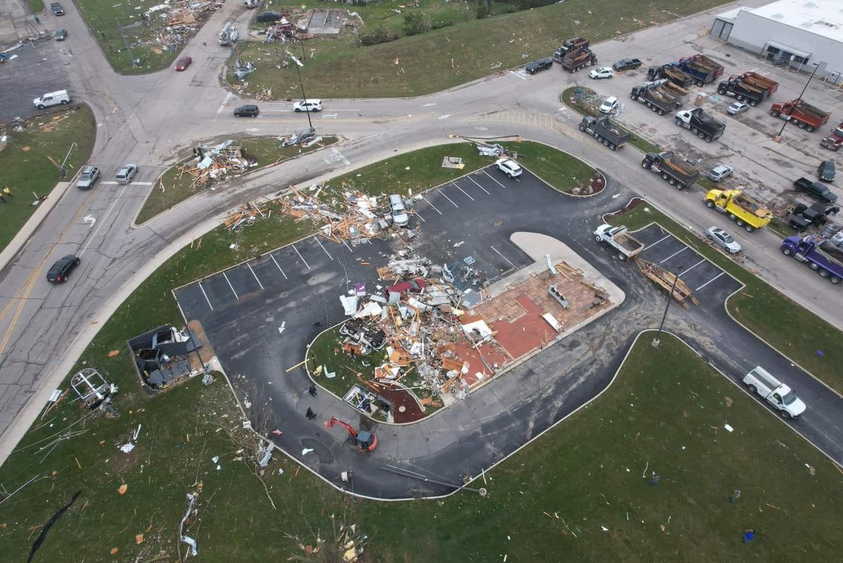 Three photos of the Taco Bell structure in Winchester, Indiana from yesterday's tornado. This structure was (>90%) swept off its foundation. Note the connections to the foundation, an excessive amount of nails with bolts, nuts, and washers— well-constructed. Credits in ALT tags.