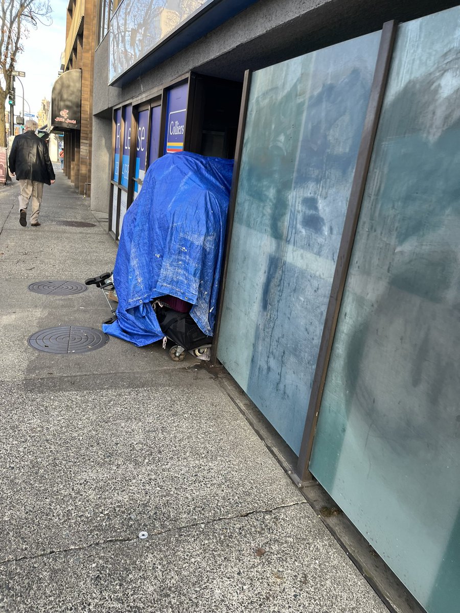 Just back from vacation and these folks are still occupying this doorway and part of the sidewalk on Fort Street #YYJ

What’s going on with this @CityOfVictoria @vicpdcanada @mattdellok @MarianneAlto ?