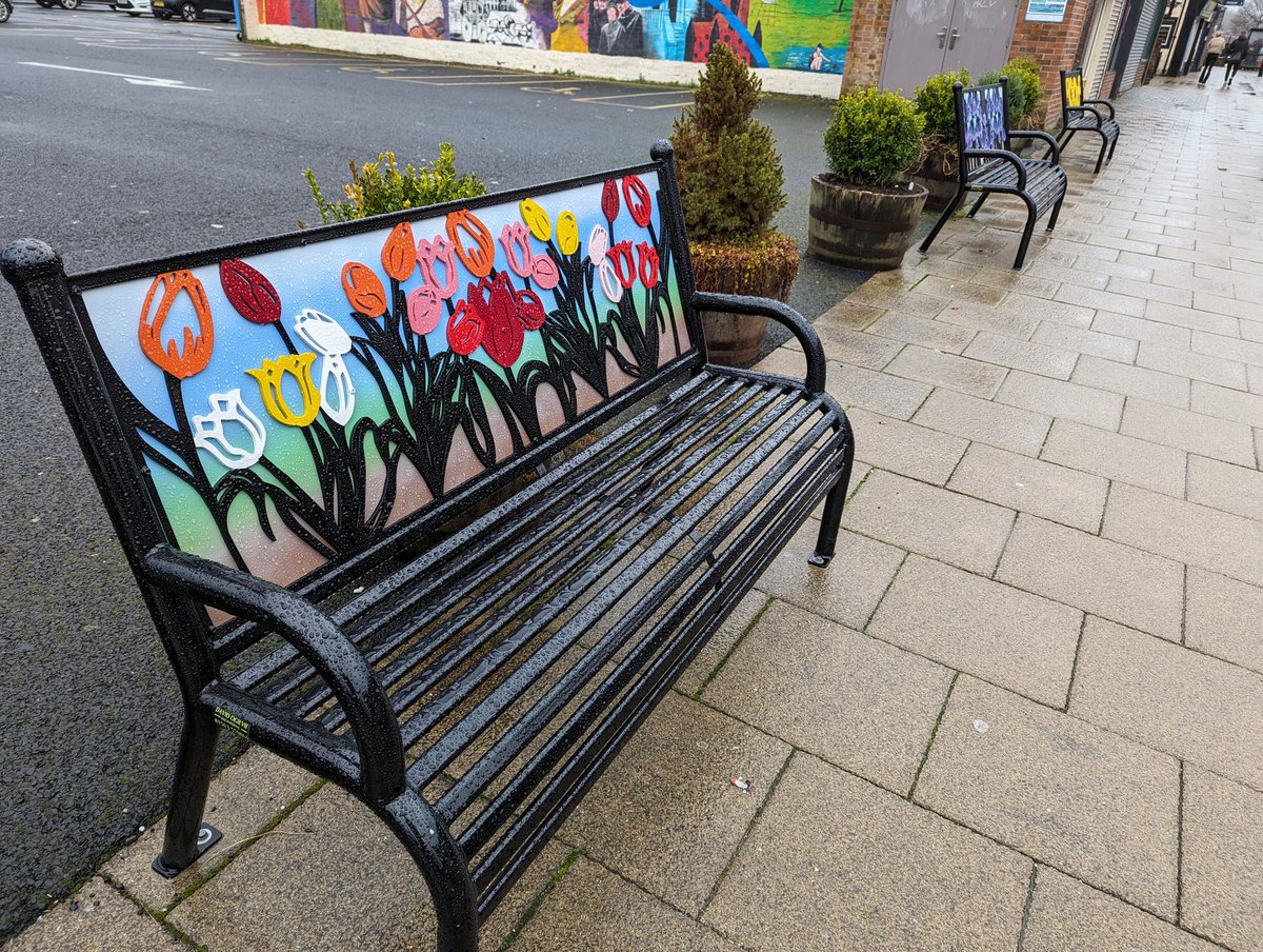 soult's tweet photo. I've no idea who we have to thank for them, but I do like these lovely new benches opposite the Post Office on #ChesterleStreet Front Street. Practical and cheery! https://t.co/yzXPWOQN9g