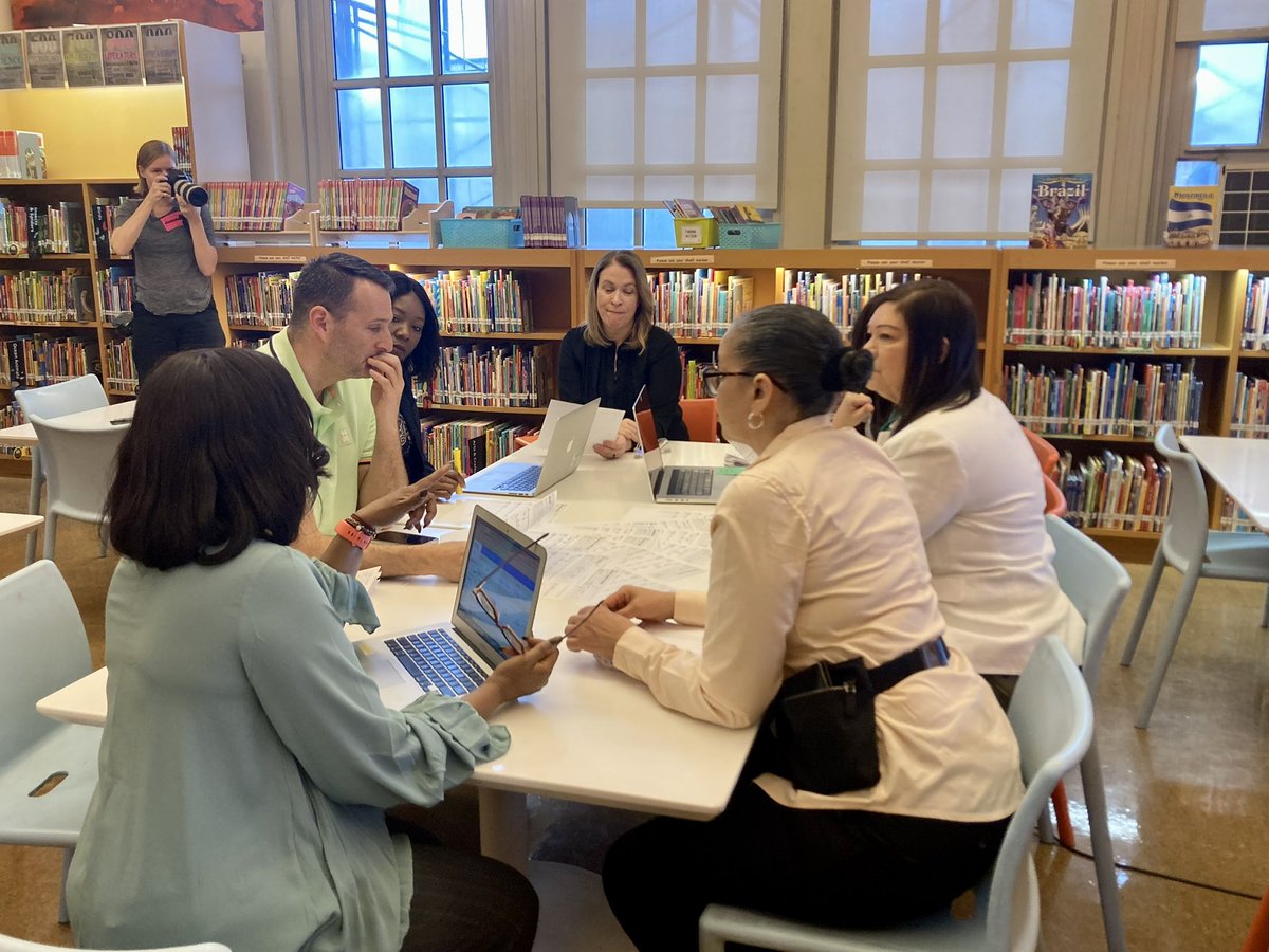 PS46BX's tweet photo. PS46X has been recognized as a “Power User School” by New Visions! Check out the Attendance Team reviewing the portal during a photo shoot! @CSD10Bronx https://t.co/JOlQu88SHh