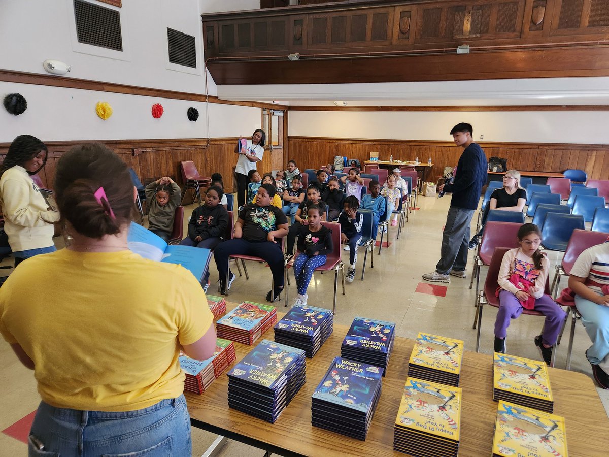 Thanks our our friends at <a href="/A4C_CAT/">ATHLETES FOR CHARITY</a> for stopping by to read to our Grades 1-3 students and for giving them a book to take home!
