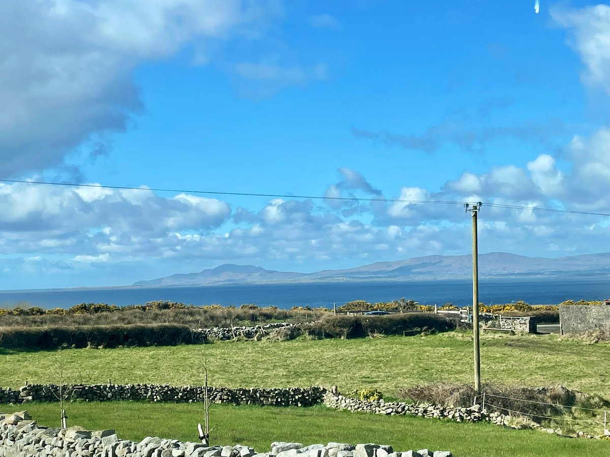 Gaze out from the comfort of #AnCaisleanRoise, #Rossnowlagh and see the expansive beauty of #DonegalBay with the mighty #SlieveLeague cliffs in the distance.  ⛰️🌊#FridayMood #holidaylet #Donegal #Ireland #WildAtlanticWay #StPatricksWeekend ☘️