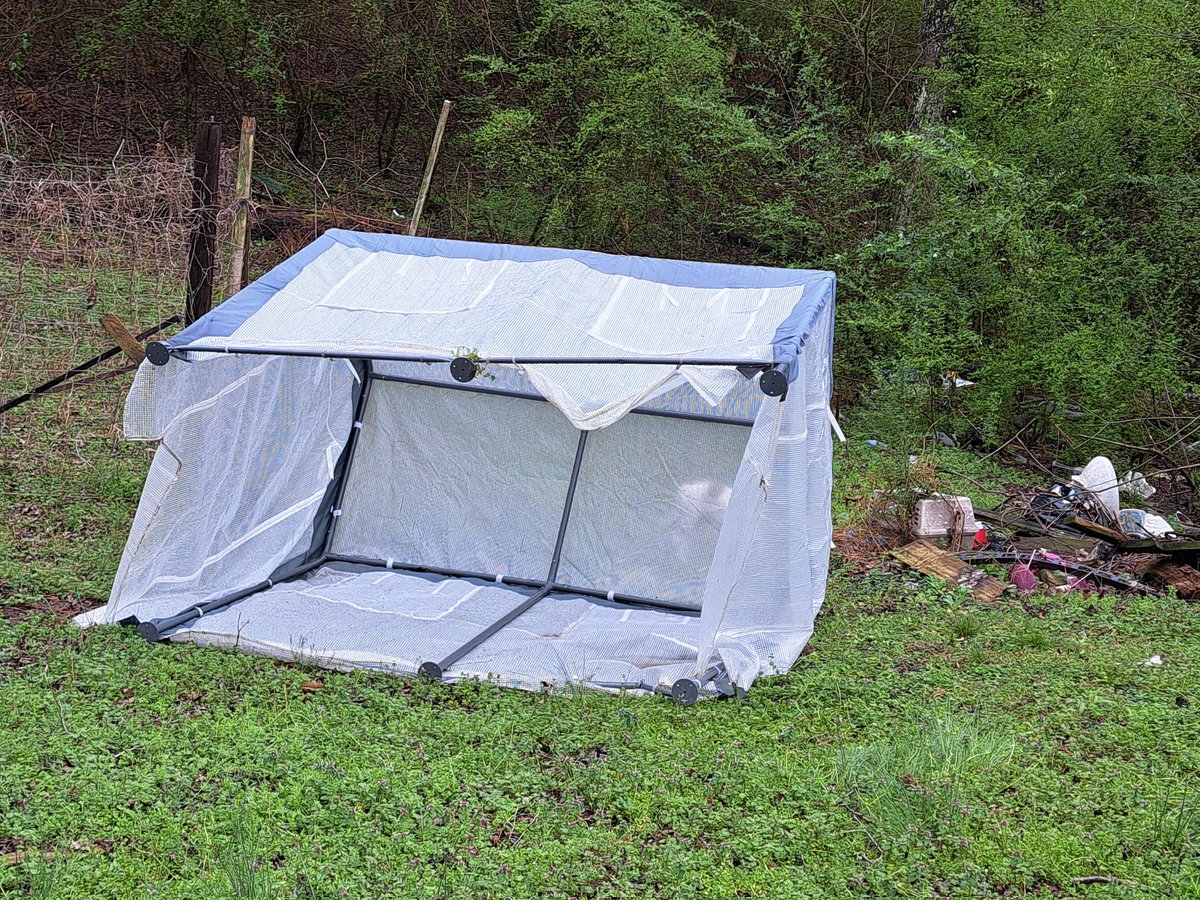 BamaLady77's tweet photo. @spann Our greenhouse got blown  from the middle of our yard to the garden 50 feet away by the wind. In Parrish this morning. https://t.co/DBzAJdE3M1