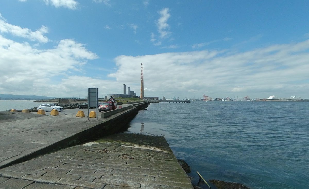 Late August 1979.  Great South Wall, Dublin. U2 photographed by Paul Slattery for a "Sounds" magazine feature (see link). In the background the iconic Poolbeg Power station chimneys later seen in the video for "Pride" x.com/SoundsClips/st… #U2