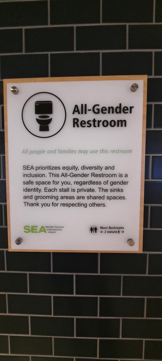 LewisCindy's tweet photo. On the way home and found public restrooms where the doors go to the floor. First time seeing all genders washing hands in the same place.  No more long lines on restrooms labeled women. 😀 #MVPSummit #seatac #inclusive https://t.co/5MTljeoVAB