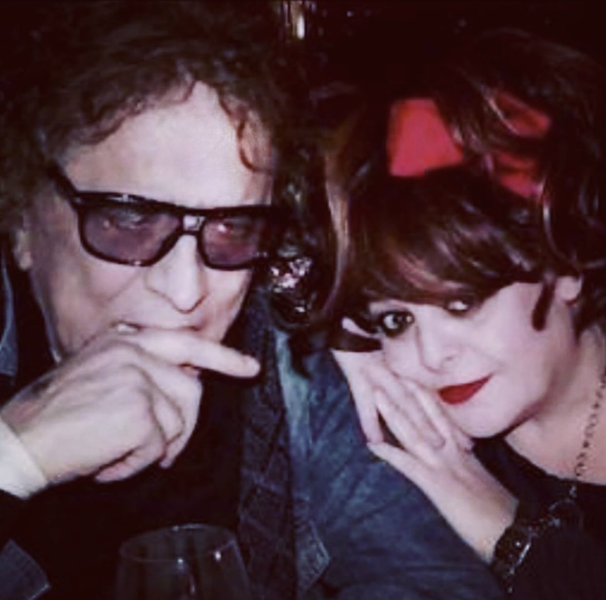 All of us here, writing on behalf of Mick Rock are devastated by the loss of the incomparable Angela McCluskey. Rest in Peace beautiful Angela… Our hearts are with your beloved Paul and your dear family. Xx Donations may be made at linktr.ee/therealmickrock