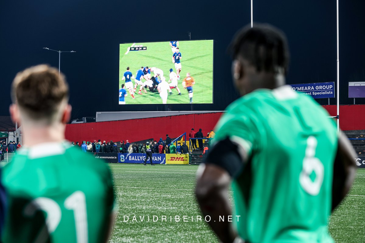 Bittersweet. Ireland U20 players watch the France vs England match at the pitch, after defeating Scotland 36-0. England were crowned champions after defeating France 45-31, topping the table with 23 points, 1 more than Ireland.