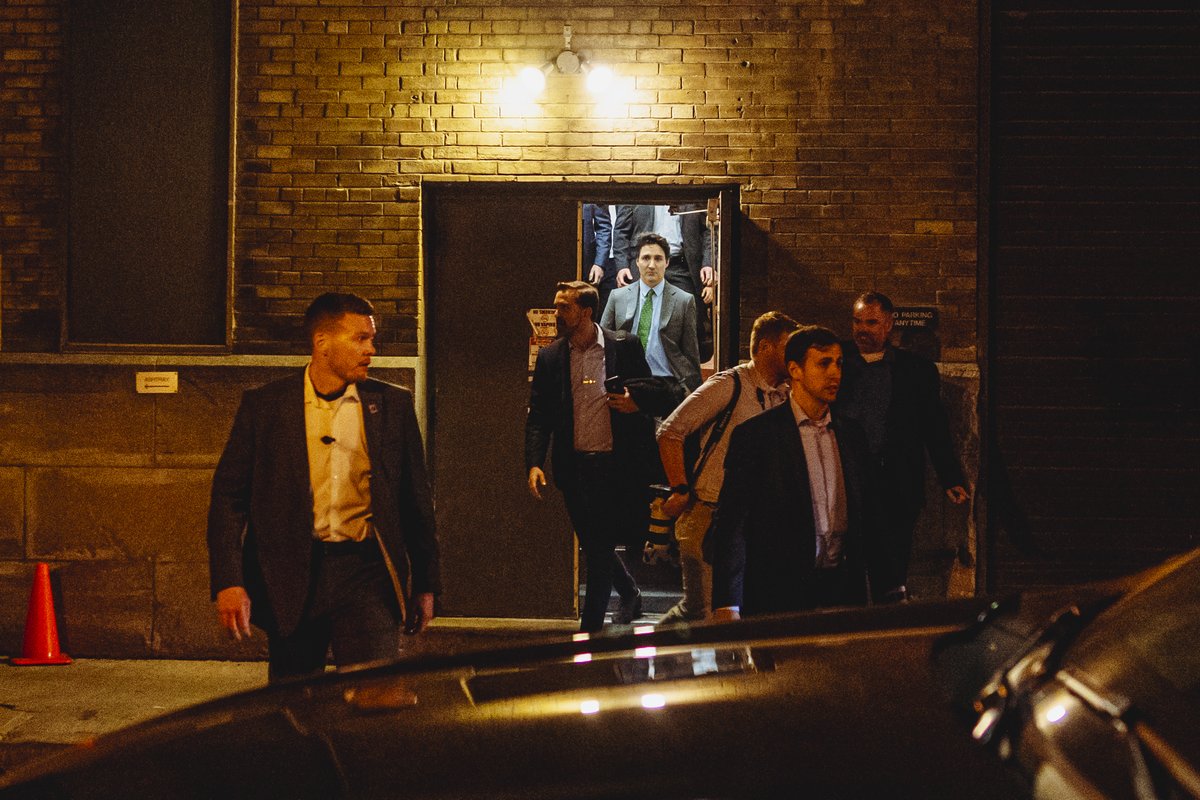 Canada's Prime Minister Justin Trudeau leaves a Liberal Party fundraising rally through the back door as supporters of a ceasefire in Gaza gather to protest near the venue in Toronto. Photo for @Reuters