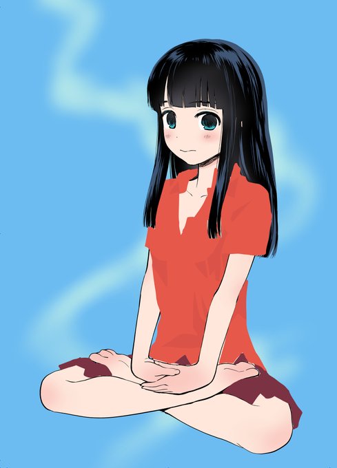 赤い服で胡坐する 