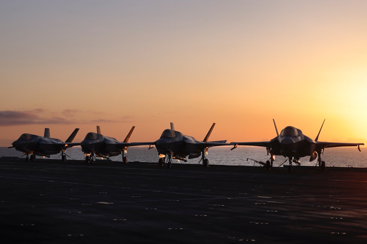 🌆 F-35B Lightning jets from 617 Squadron Royal Air Force lined up on the flight deck of HMS Prince of Wales at sunrise during Exercise Nordic Response, part of the NATO exercise #SteadfastDefender.