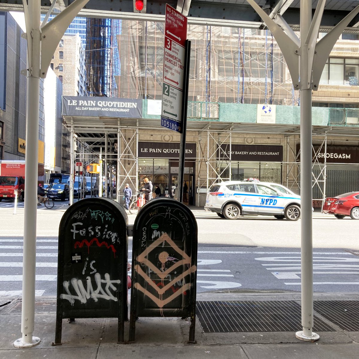 Cozy pair of USPS relay boxes sharing a moment under scaffolding in midtown. #PostboxSaturday #ScaffoldSunday #NYC