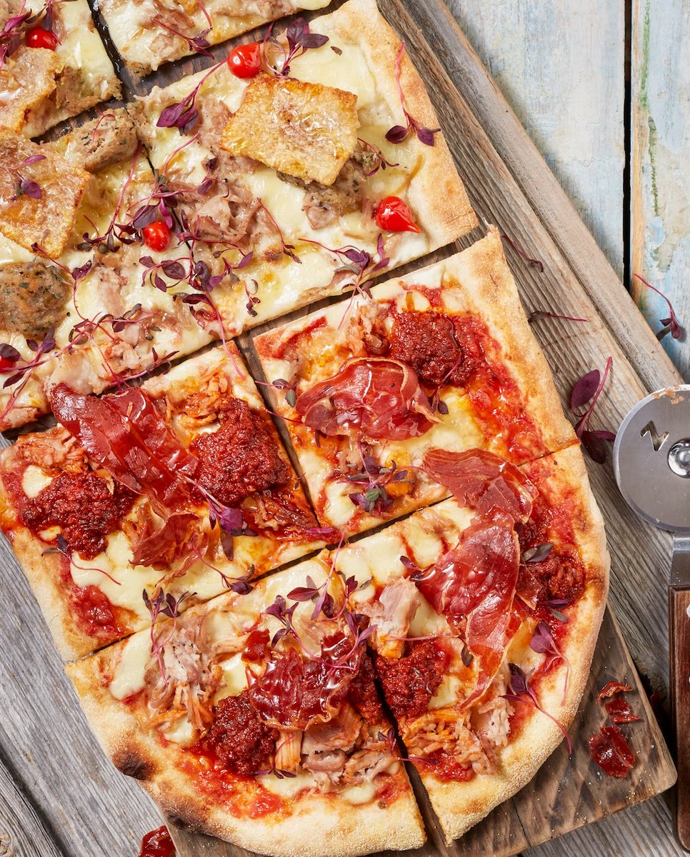 Which side of the Rustica Sticky Pig pizza is your favourite? 🍕 A rich red base topped with spicy ‘nduja, finished with crispy prosciutto and riserva cheese. 🧀 A white base, with smoky scamorza cheese, crumbled meatballs, crackling and Roquito pearls.