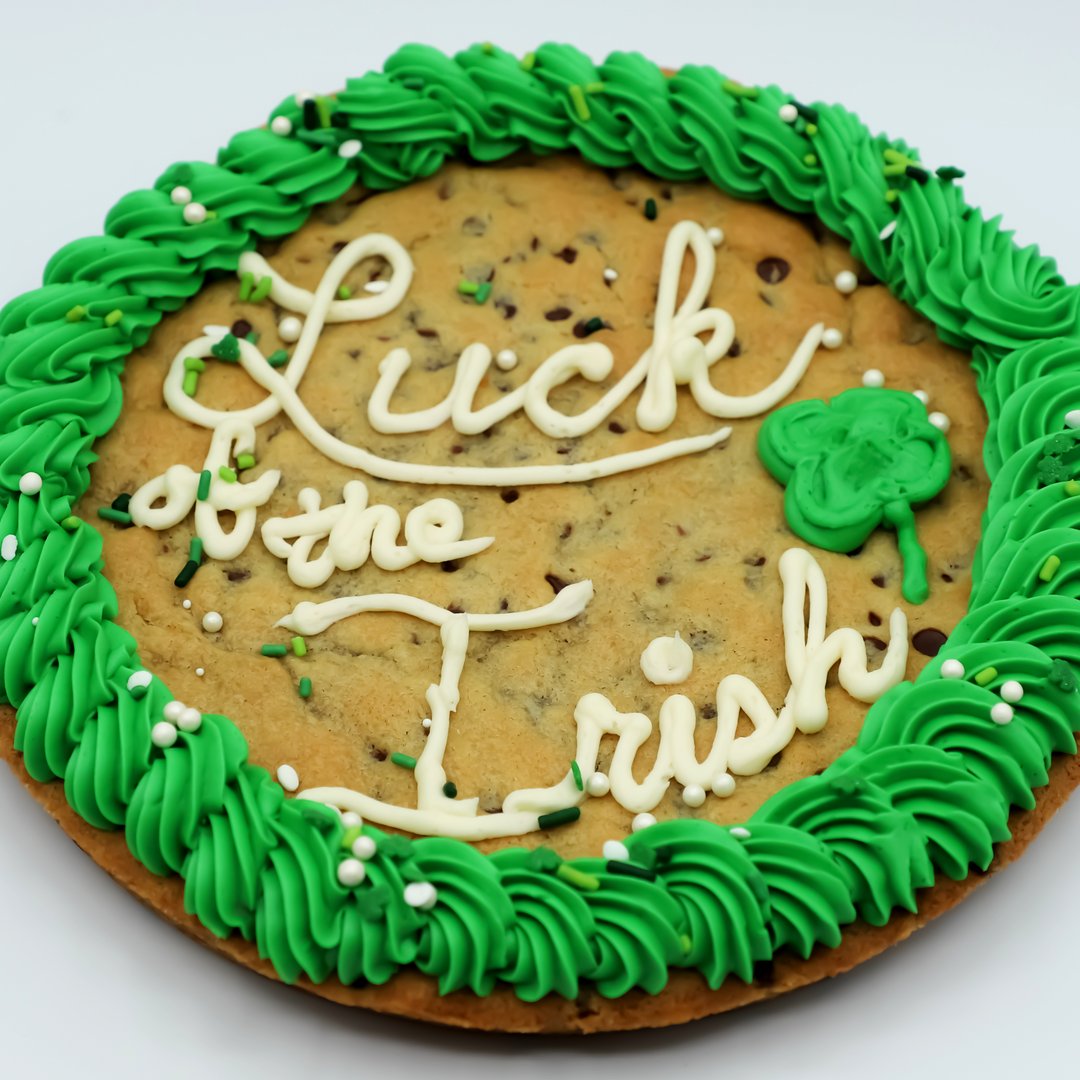 ShamROCK your green today by celebrating the holiday with us! 💚 Indulge in a lucky treat like no other, but we can't promise you won't get pinched.

#luckoftheIrish #weargreen #SaintPatricksDay #custom #cookiecake #fourleafclover #lucky #shamrock #downtownalbion #localbakery