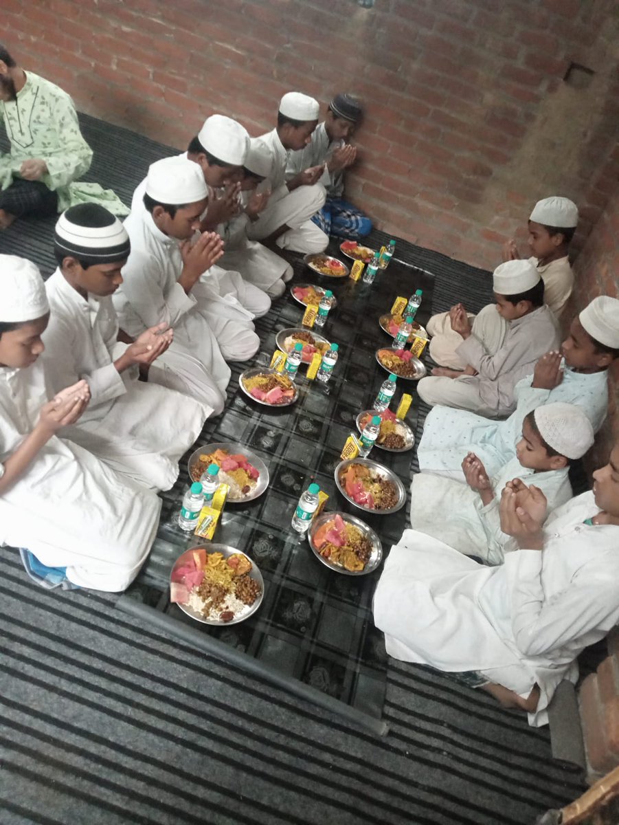 Regular Iftar at our Madarsa Kindly ignore the walls as it's a rented property and we are very soon going to shift to a new place with all amenities.