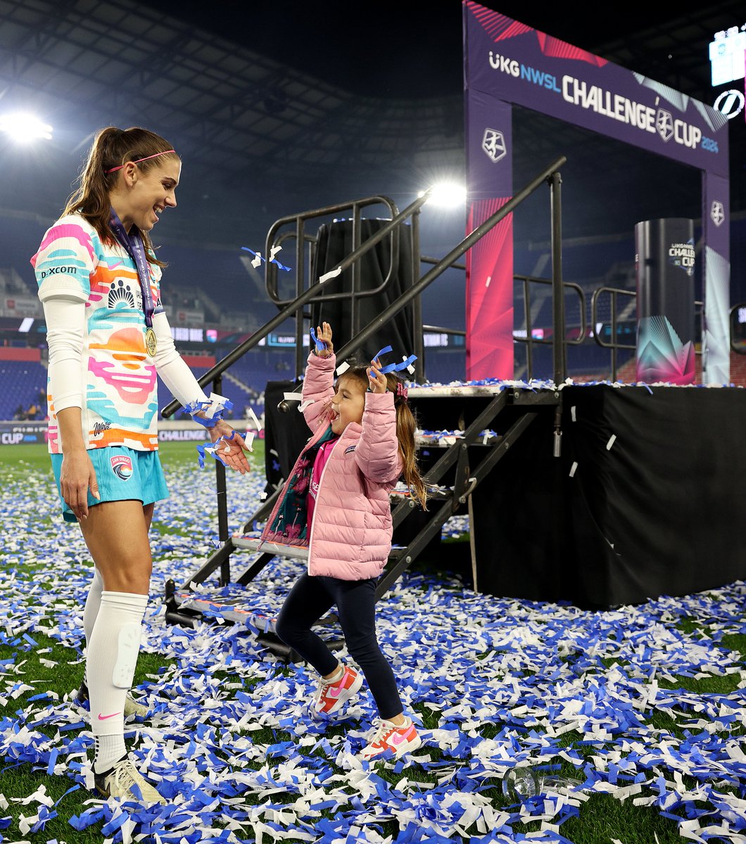 Alex Morgan of the San Diego Wave FC celebrates with her daughter Charlie Carrasco after the 2024 NWSL Challenge Cup at Red Bull Arena

#MakeWaves 

Photo by Elsa/Getty Images