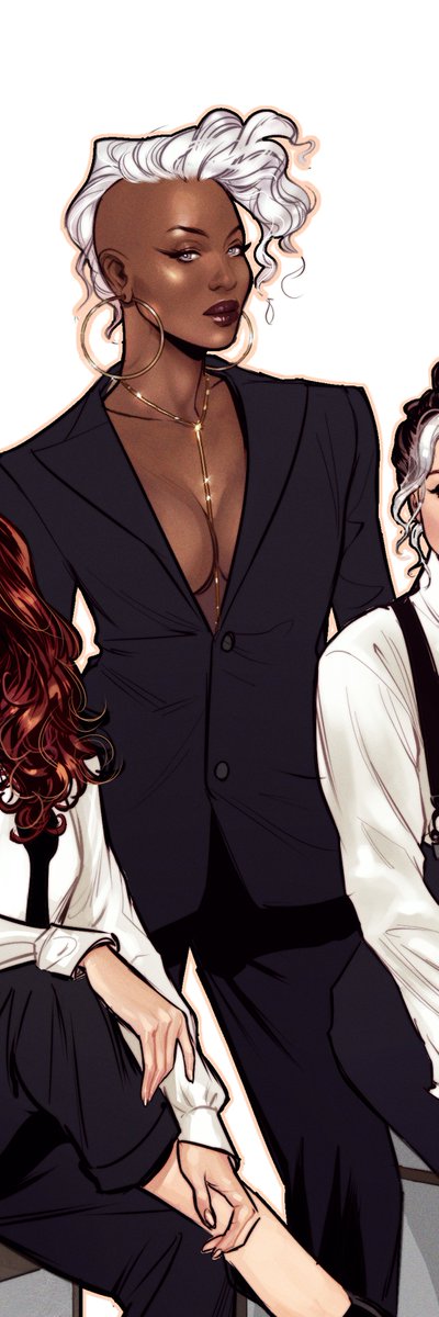 The subject is Ororo in a suit✨✨✨