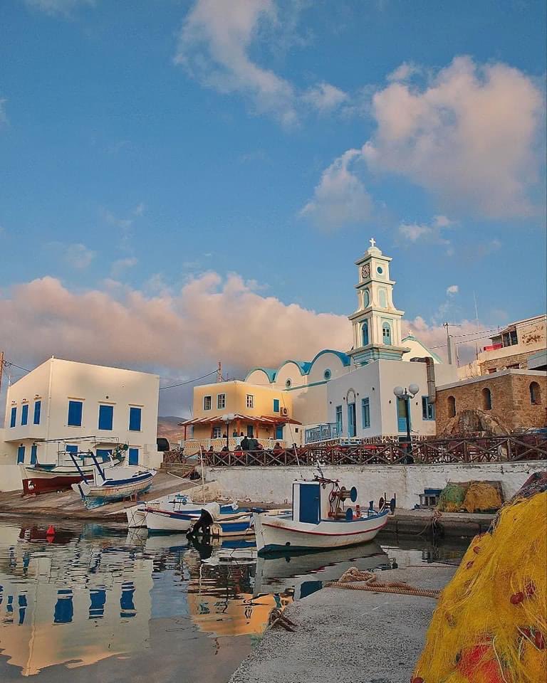 Blessed Sunday from a postcard-perfect Greek island! 🇬🇷 A few bobbing boats in a tranquil harbor, the calm sea mirroring the endless blue sky. A charming white chapel adds a touch of peace. ️ #GreekIslands #SundayVibes