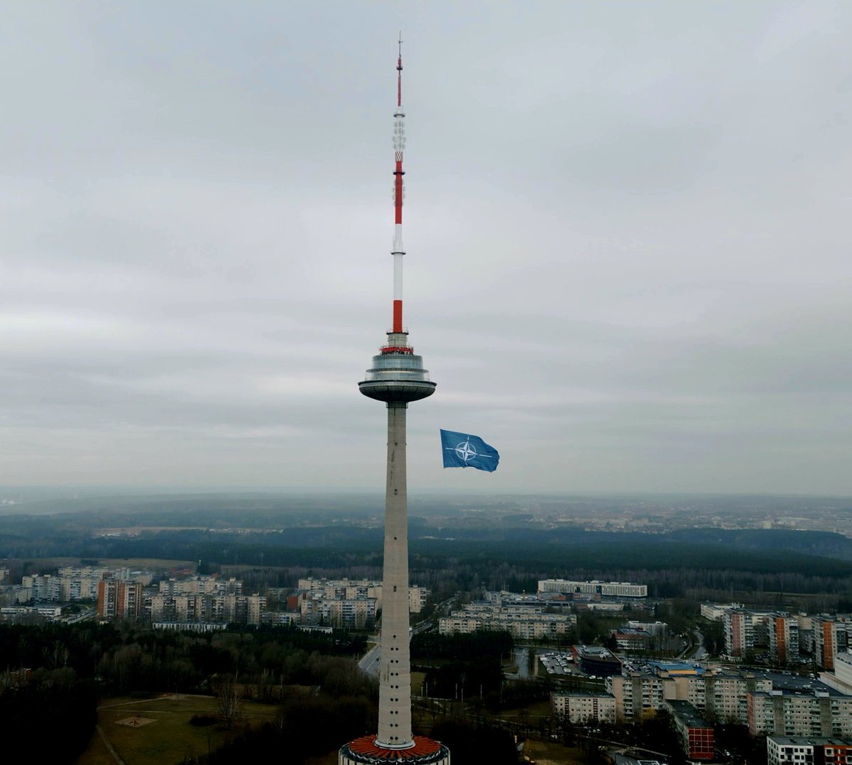 We celebrate the 2️⃣0️⃣ anniversary of Lithuania's @NATO membership by raising an impressive 540 square meters #NATO flag on TV tower! #WeAreNATO #20YearsofSuccess #StrongerTogether 📸 Telecentras