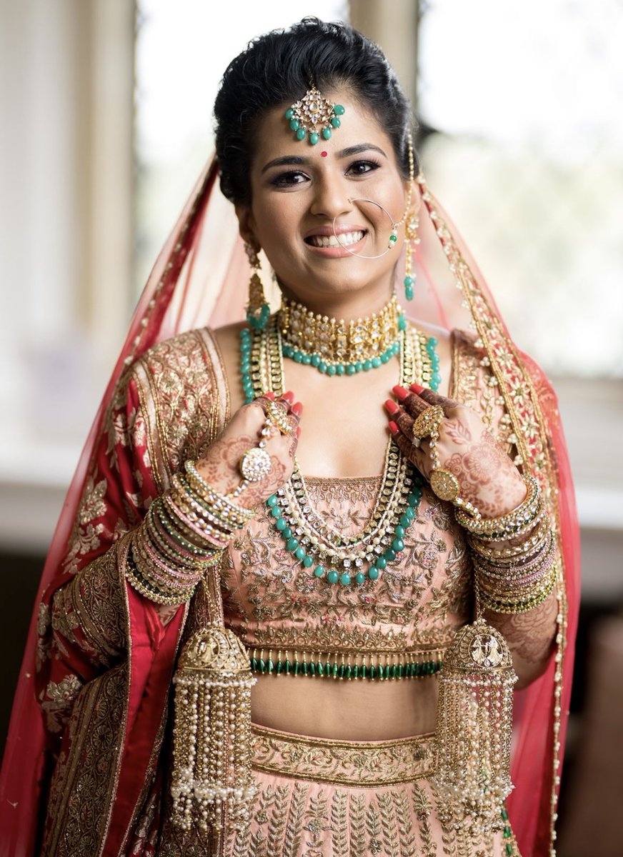 Radiant vibes all the way! ✨ No wonder this stunning bride picked Gini Bhogal (<a href="/ginibhogal/">Gini Bhogal</a>) as her makeup artist. That glow speaks volumes! 💖 

🔗 Find all your wedding suppliers on l8r.it/gIX3

MUA: <a href="/ginibhogal/">Gini Bhogal</a>
Photography: @edpereiraphoto